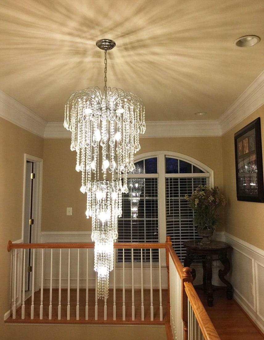 Artistry Falls 18 Light Crystal Chandelier Chrome 60 x 24: Artistry Falls 18 Light Crystal Chandelier Chrome 60 x 24 Modern chrome-plated crystal chandelier with 18 lights and a height-adjustable design. It features Grand King Cut K-9 crystals, a round shade 