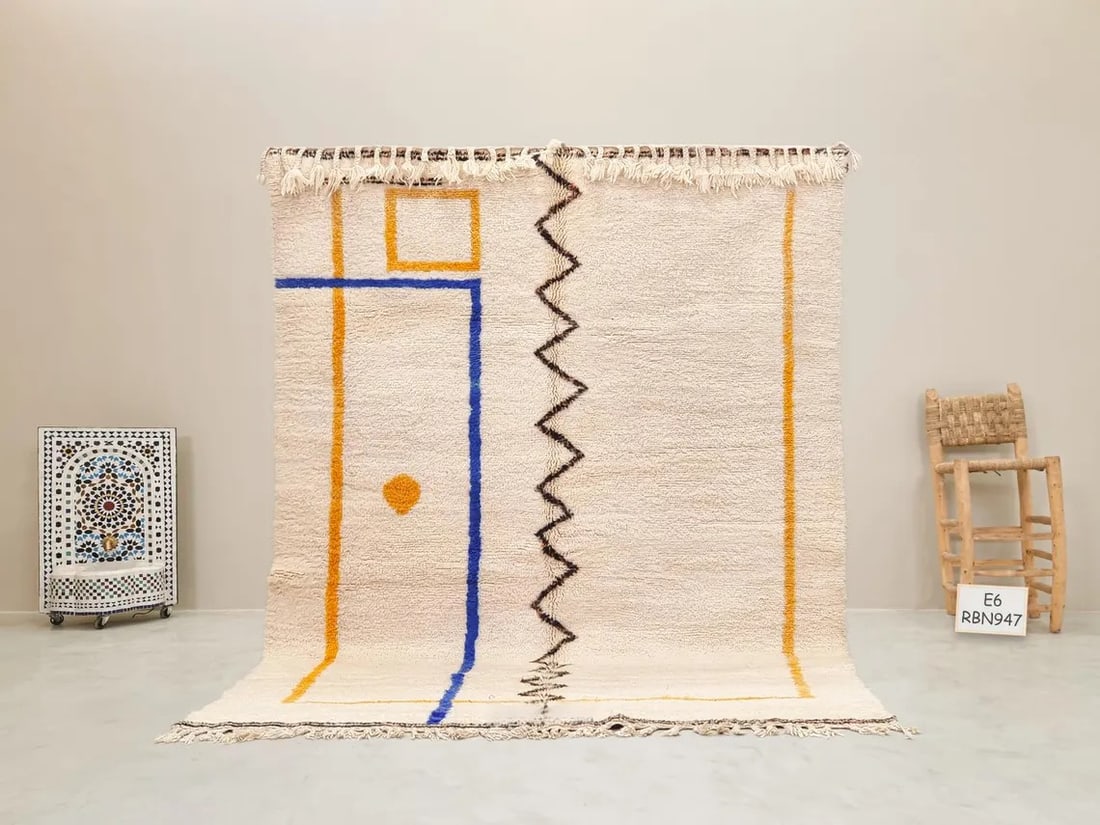Authentic Handmade Berber Wool Rug from Morocco 6.56 x 5ft: Authentic Handmade Berber Wool Rug from Morocco 6.56 x 5ft Experience the exquisite craftsmanship of this genuine Berber wool rug, meticulously handwoven by skilled artisans from the Atlas Mountains o