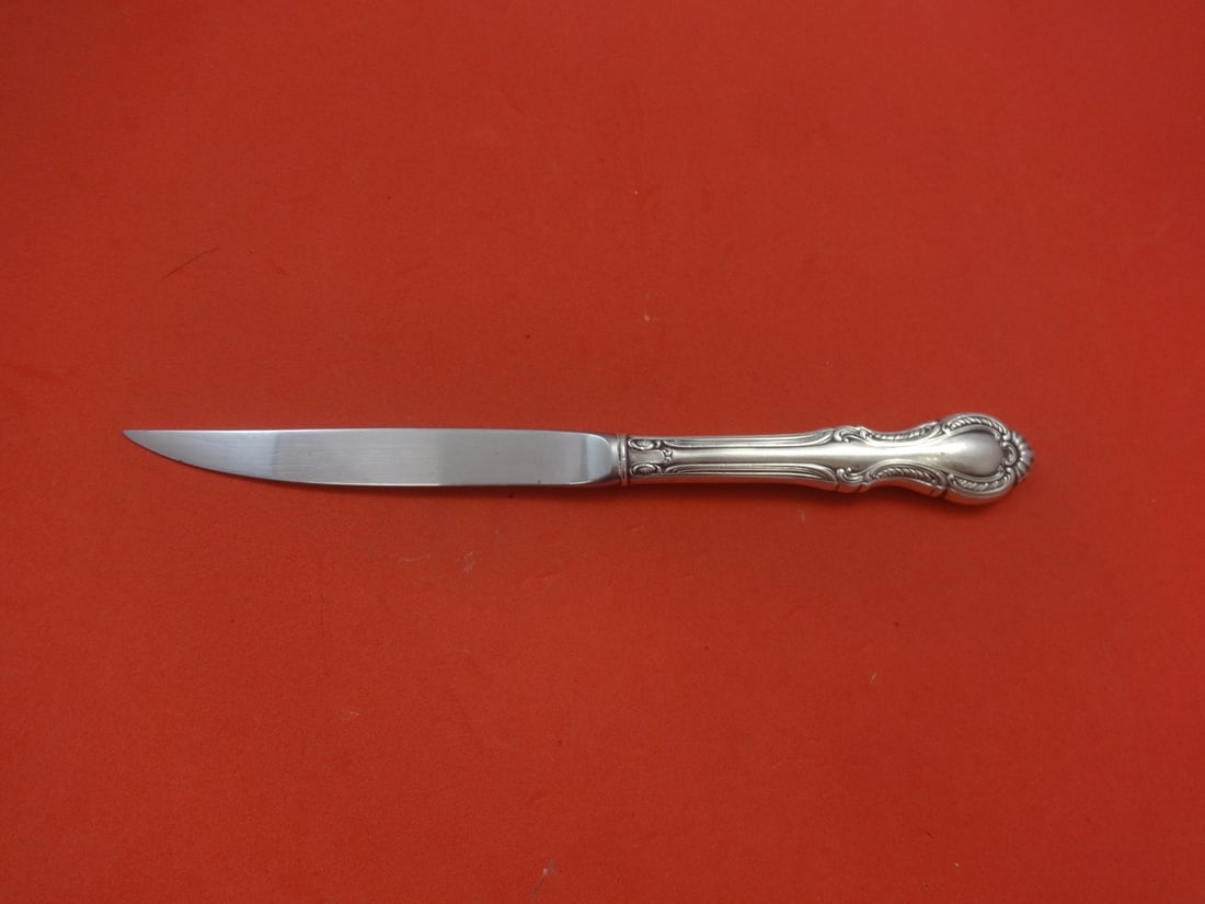 International Sterling Silver Southern Colonial Steak Knife 8 3/4": International Sterling Silver Southern Colonial Steak Knife 8 3/4" This exquisite steak knife from the Southern Colonial pattern by International Sterling is crafted from high-quality sterling silver.
