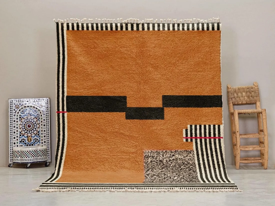 Moroccan Berber Wool Area Rug 5 x 8 ft Handmade: Moroccan Berber Wool Area Rug 5 x 8 ft Handmade This handmade Berber wool rug showcases the fusion of ancestral Moroccan craftsmanship with modern artistic design. Expertly woven by Berber women artis