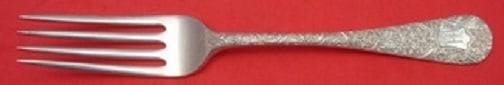 Whiting Antique Chased Sterling Silver Dinner Fork Monogrammed 7 3/4": Whiting Antique Chased Sterling Silver Dinner Fork Monogrammed 7 3/4" This exquisite antique chased dinner fork from Whiting is a stunning addition to any table setting. Crafted from sterling silver, 