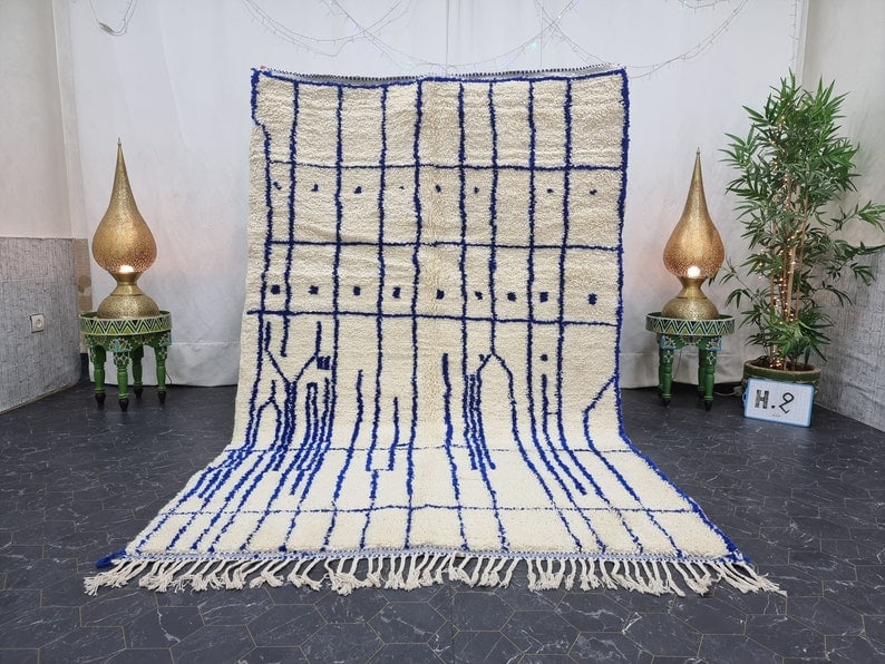 Handmade Moroccan Berber Wool Area Rug 9.84 x 6.56 feet: Handmade Moroccan Berber Wool Area Rug 9.84 x 6.56 feet Enhance your space with this Beautiful Authentic Soft White Handmade Moroccan Berber Wool Area Rug. Handwoven by skilled local Berber women in t