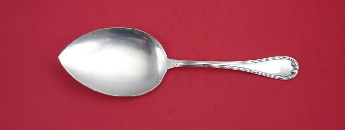Christofle Rubans Silverplate Ice Cream Slice 10 3/4" Serving Piece: Christofle Rubans Silverplate Ice Cream Slice 10 3/4" Serving Piece Elevate your dessert presentation with this exquisite Rubans by Christofle silverplate ice cream slice. Measuring 10 3/4" in length,