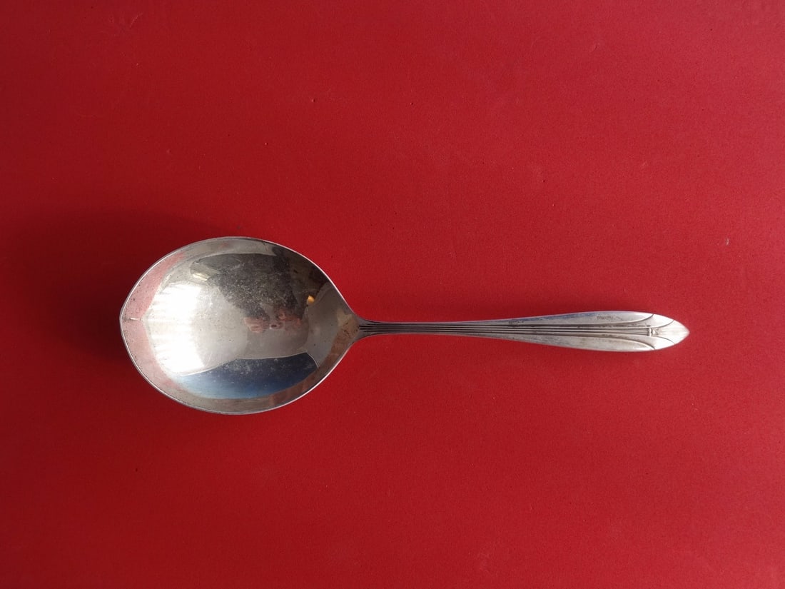 International Sterling Silver Elsinore 9 3/8 Serving Spoon: International Sterling Silver Elsinore 9 3/8 Serving Spoon This exquisite serving spoon is from the Elsinore pattern by International Sterling. Made of high-quality sterling silver, it measures 9 3/8 