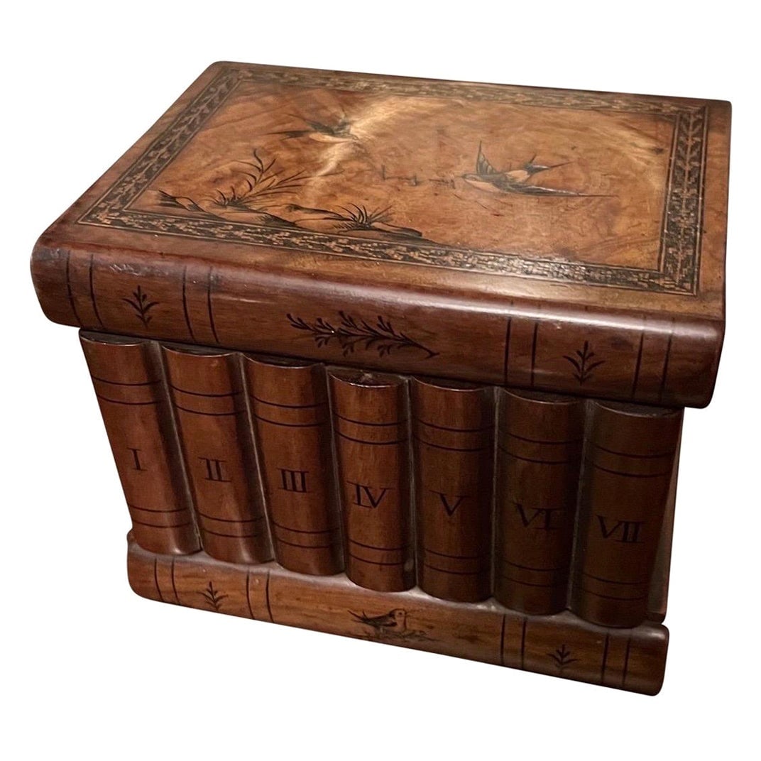 French Marquetry Inlaid Hardwood Box with Faux Book Hidden Storage: French Marquetry Inlaid Hardwood Box with Faux Book Hidden Storage This unique antique storage box features a faux book front and fine marquetry inlay on the top, depicting birds. Designed in the Fren