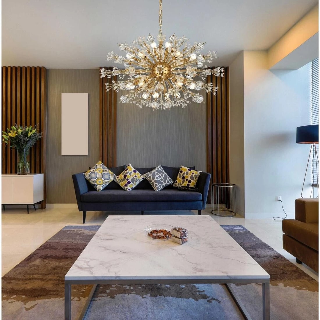 Vera 24 Light Goldish Crystal Glass Chandelier 36 Inch: Vera 24 Light Goldish Crystal Glass Chandelier 36 Inch This modern Sputnik-style chandelier features a striking gold finish frame adorned with high-quality clear glass and crystal elements. Designed w