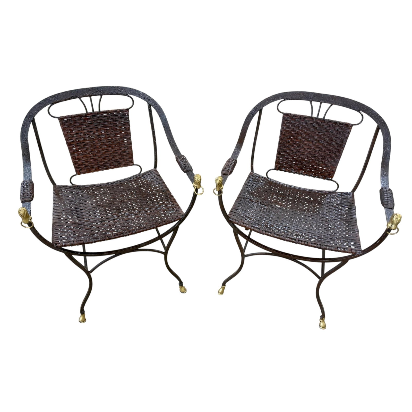 Set of Two Neoclassical Iron Curule Armchairs with Gilt Horse Head Accents: Set of Two Neoclassical Iron Curule Armchairs with Gilt Horse Head Accents This pair of Maison Jansen-style curule armchairs from France, circa 1960s, features sculptural forms crafted from forged iro