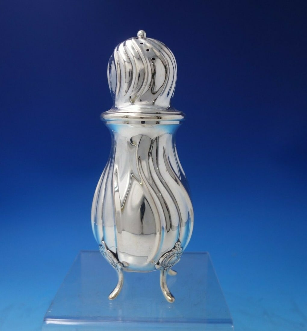 Swedish Sterling Silver Muffineer 7.5" Tall 8oz Circa 1940: Swedish Sterling Silver Muffineer 7.5" Tall 8oz Circa 1940 This exquisite Swedish sterling silver muffineer, crafted circa 1940, showcases a charming swirl design. Standing at 7 1/2" tall and measurin