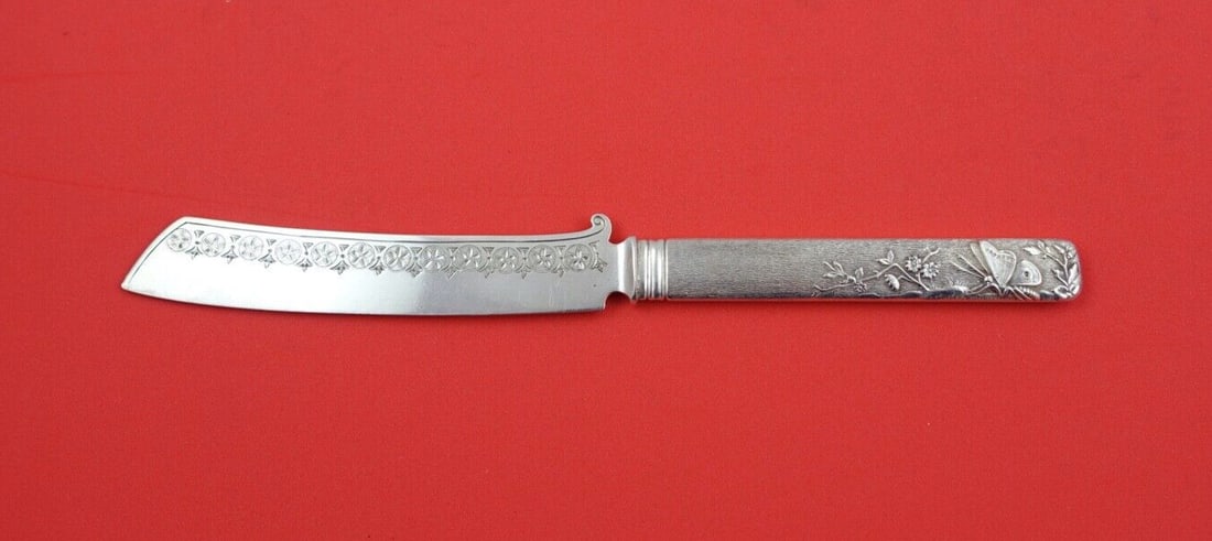 Antique Sterling Silver Tea Knife 8 Inch Aesthetic Butterflies Design: Antique Sterling Silver Tea Knife 8 Inch Aesthetic Butterflies Design This exquisite sterling silver tea knife features an Aesthetic design with intricate hand-engraved butterflies among lush foliage.