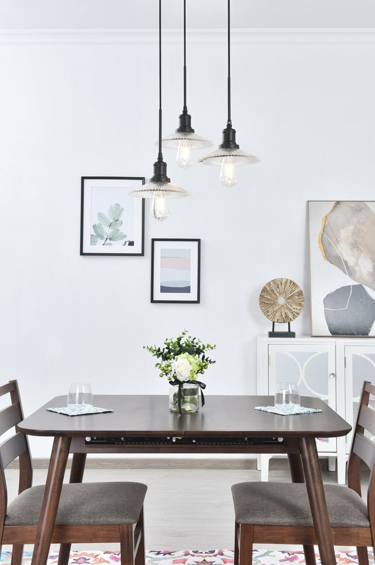 Waltz Black Glass 3-Light Pendant Chandelier: Waltz Black Glass 3-Light Pendant Chandelier This modern pendant chandelier features a sleek black finish paired with clear cone-shaped glass shades, offering a contemporary touch suitable for dining 