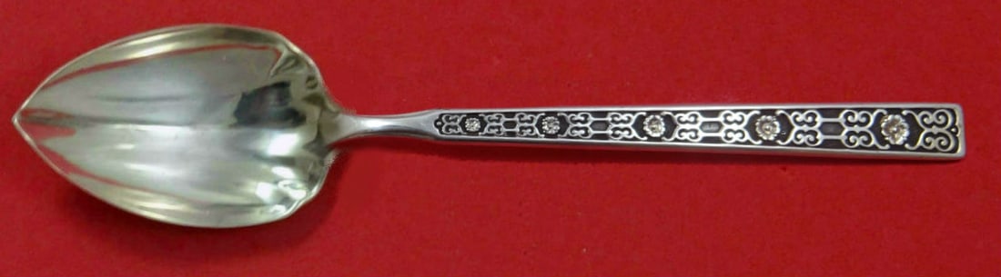 Gorham Spanish Tracery Sterling Silver Grapefruit Spoon Custom Fluted 5 3/4": Gorham Spanish Tracery Sterling Silver Grapefruit Spoon Custom Fluted 5 3/4" This exquisite grapefruit spoon features a beautiful fluted design, crafted in sterling silver by Gorham. The piece is part