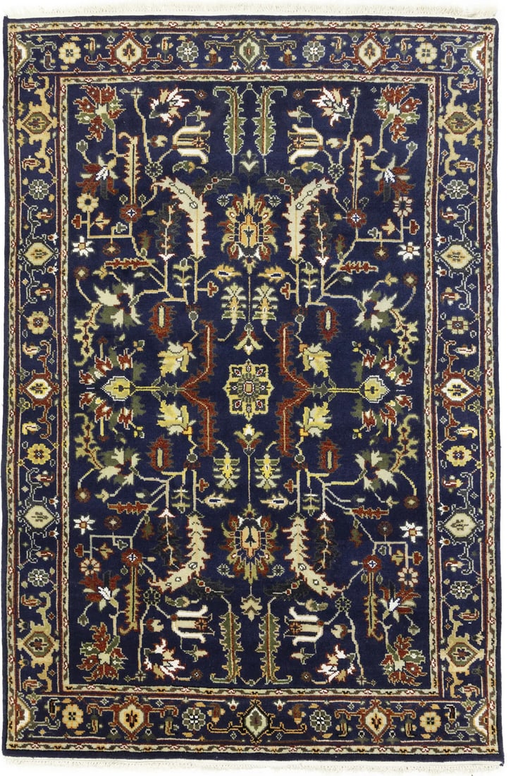 Hand-Knotted Wool Area Rug 6'1 x 9'1 Floral Pattern Dark Navy: Hand-Knotted Wool Area Rug 6'1 x 9'1 Floral Pattern Dark Navy This traditional Oriental area rug features a dark navy background with floral patterns in cream, rusty red, gray, buff, and beige tones. 