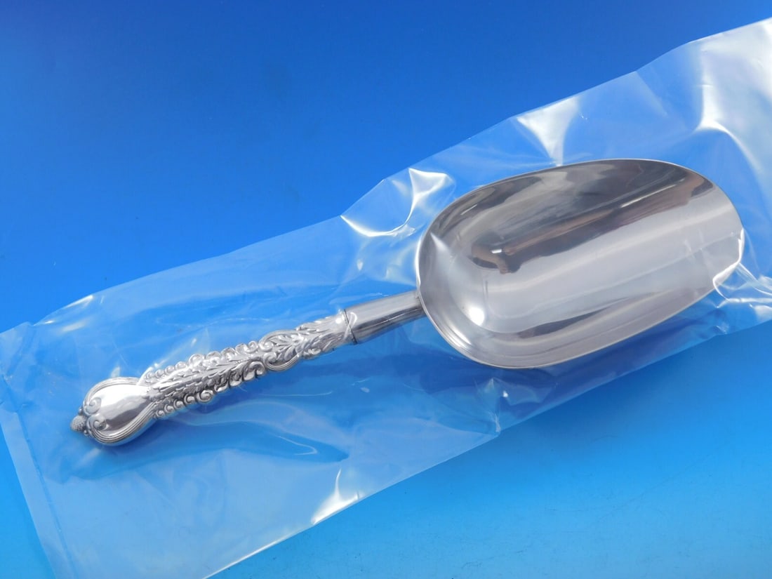 Tiffany & Co. Florentine Sterling Silver Ice Scoop Custom 9 1/4": Tiffany & Co. Florentine Sterling Silver Ice Scoop Custom 9 1/4" Presenting a stunning Florentine ice scoop from Tiffany & Co., custom made with a hollow handle in sterling silver. This exquisite piec
