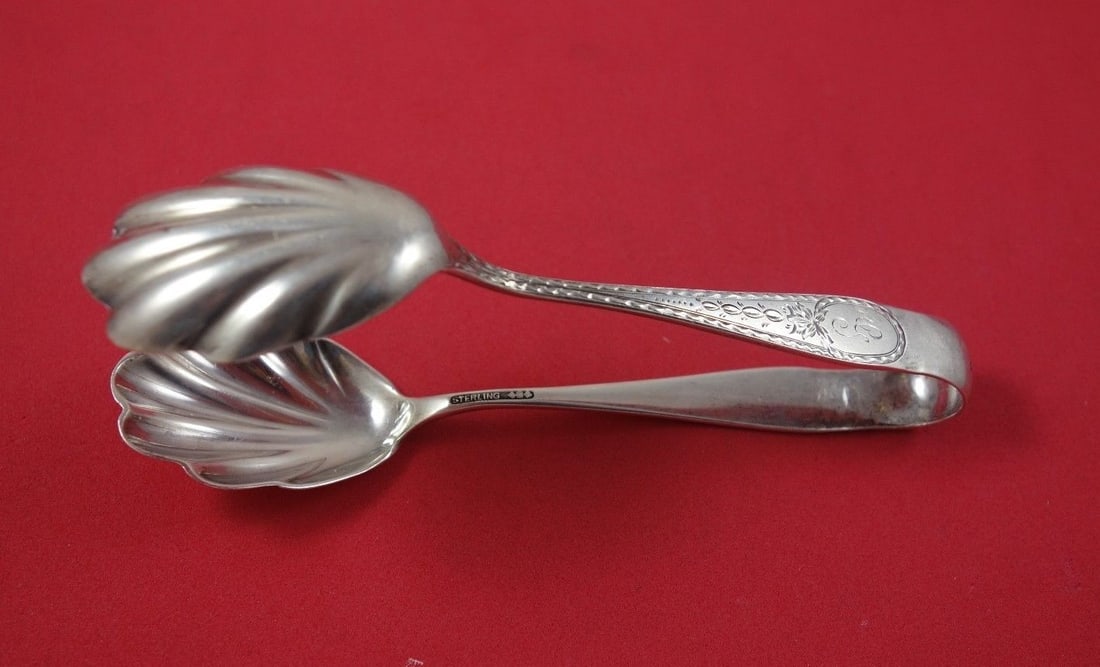 Schofield Sterling Silver Monogrammed Ice Tong 5 1/4": Schofield Sterling Silver Monogrammed Ice Tong 5 1/4" This exquisite ice tong by Schofield is crafted from high-quality sterling silver, showcasing both elegance and functionality. Measuring 5 1/4" in