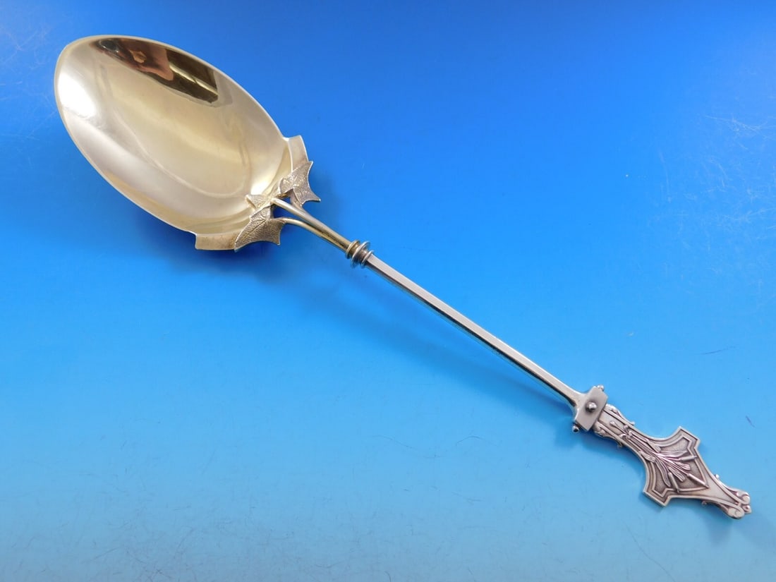 Whiting Cat Tails Sterling Silver Berry Spoon Gold Wash 9 3/4": Whiting Cat Tails Sterling Silver Berry Spoon Gold Wash 9 3/4" This exquisite serving spoon features the 'Cat Tails' pattern by Whiting Manufacturing Company, crafted from sterling silver with a beaut
