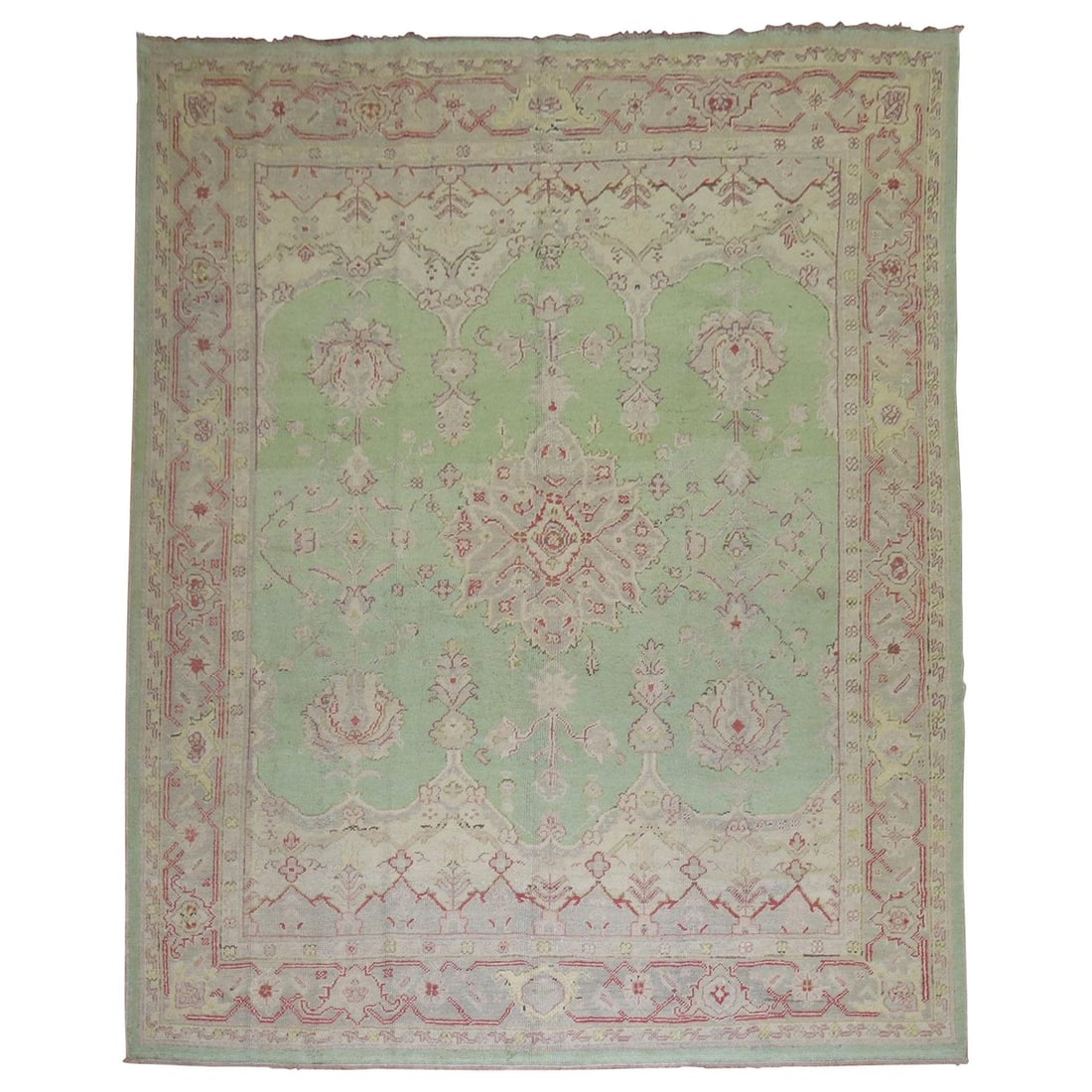 Antique Turkish Oushak Carpet Green Room Size 9 x 11'5: Antique Turkish Oushak Carpet Green Room Size 9 x 11'5 This exquisite antique Turkish Oushak carpet features a captivating mint green field complemented by a gray border adorned with accents of pink, 