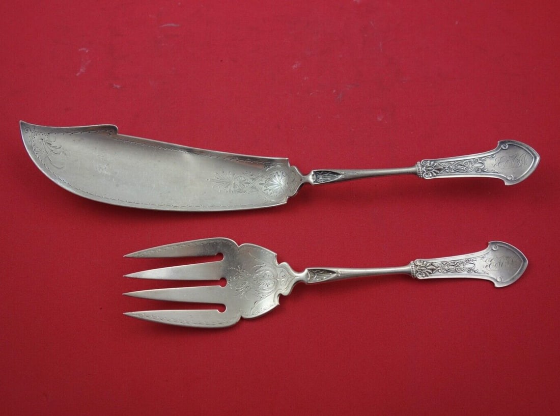2-Piece Sterling Silver Fish Server and Fork Set Corinthian Pattern: 2-Piece Sterling Silver Fish Server and Fork Set Corinthian Pattern This is a Gorham Corinthian sterling silver two-piece fish serving set featuring original bright-cut detailing. The set includes a f