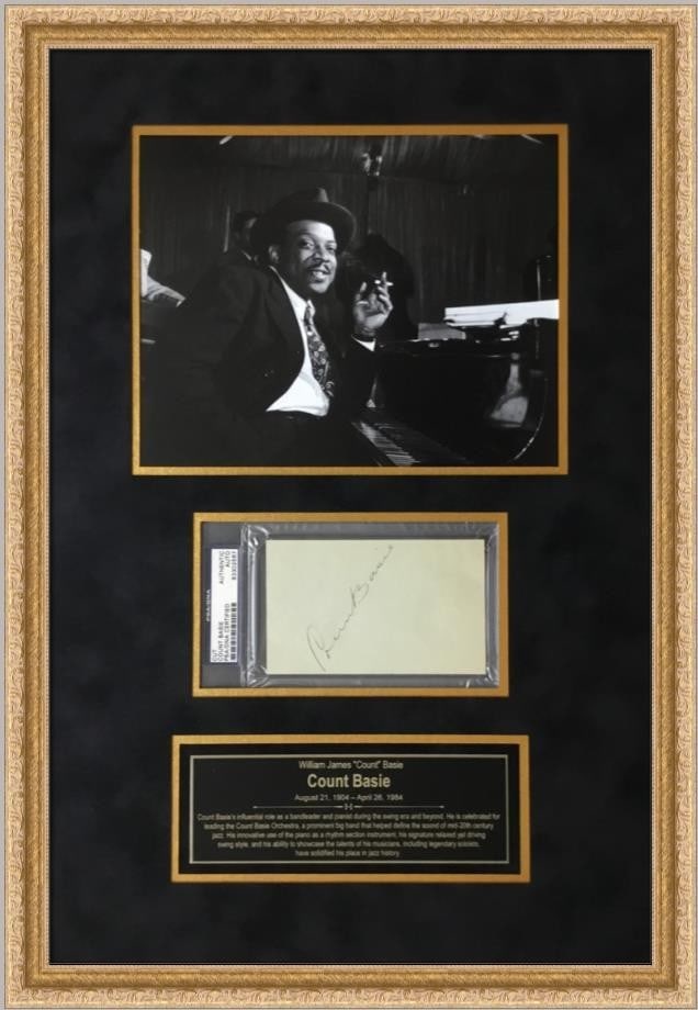 Count Basie Signed Photo PSA/DNA Framed Display Jazz Legend: Count Basie Signed Photo PSA/DNA Framed Display Jazz Legend This stunning framed display features a signed cut by jazz legend Count Basie, authenticated by PSA/DNA. The elegant 1" gold ornate frame me