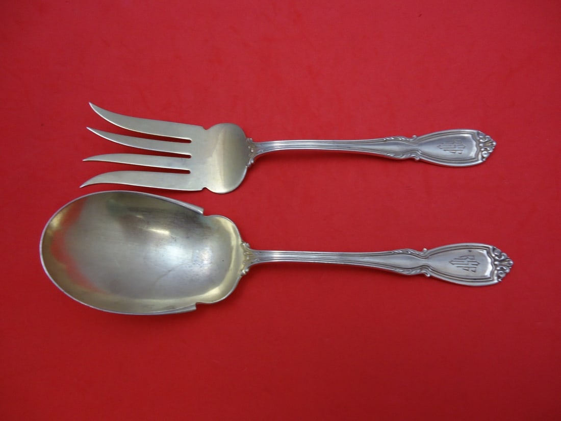 Durgin Wellington Sterling Silver Goldwashed Salad Serving Set 2pc 8 7/8": Durgin Wellington Sterling Silver Goldwashed Salad Serving Set 2pc 8 7/8" This exquisite two-piece salad serving set features the elegant Wellington pattern by Durgin. Made from high-quality sterling 
