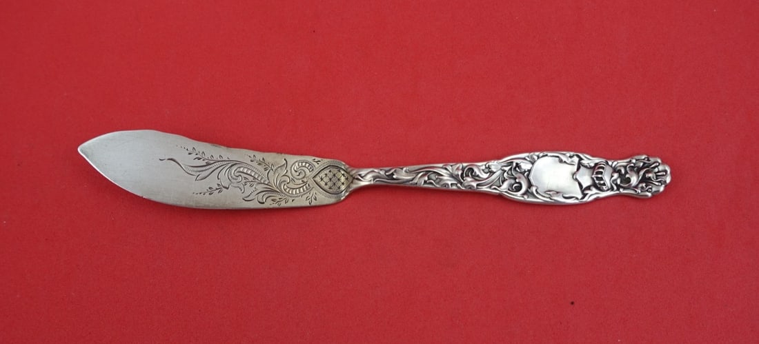 Master Butter Knife Sterling Silver Heraldic Pattern Flat Handle Brite Cut 7 Inch: Master Butter Knife Sterling Silver Heraldic Pattern Flat Handle Brite Cut 7 Inch This is a Whiting Heraldic pattern master butter knife featuring a flat sterling silver handle and a brite-cut blade. 