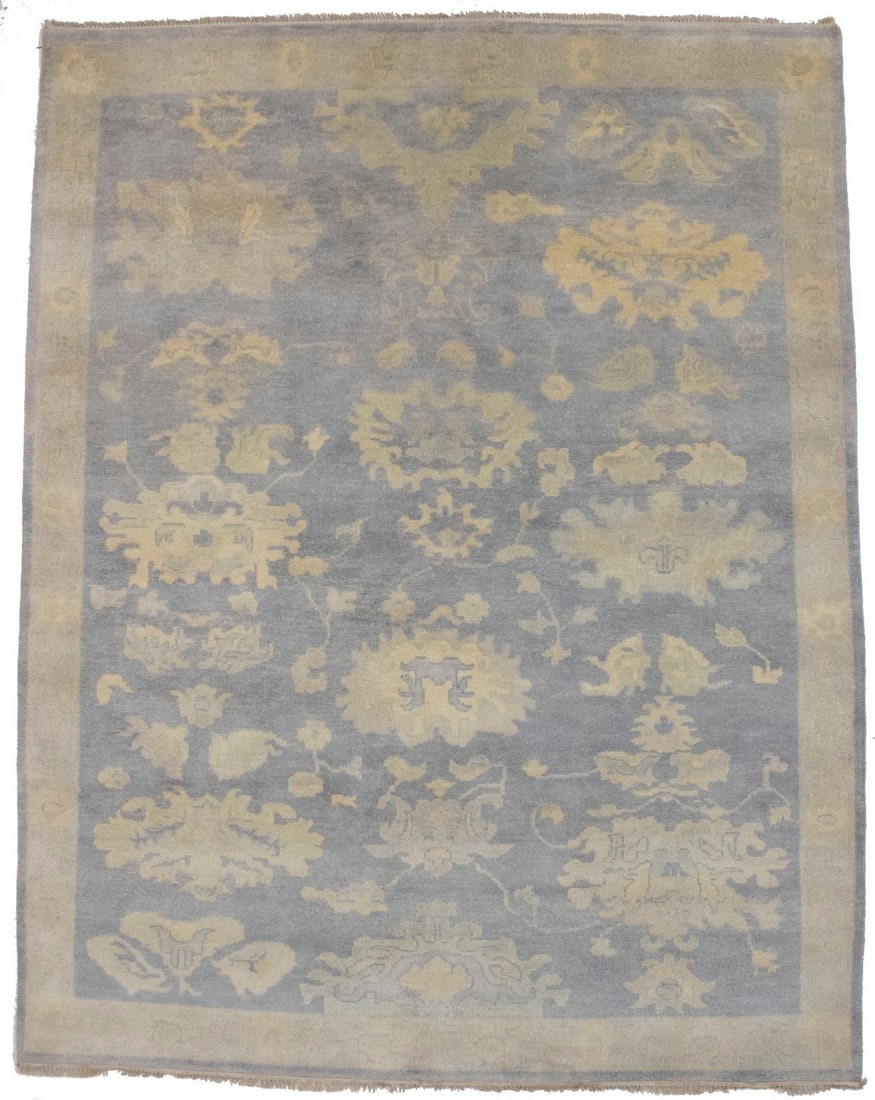 Muted Floral Oushak Chobi Wool Rug 7'10 x 9'10 Hand-Knotted Area Carpet: Muted Floral Oushak Chobi Wool Rug 7'10 x 9'10 Hand-Knotted Area Carpet This hand-knotted Oushak Chobi area rug features a muted floral pattern in shades of gray and beige. Crafted from wool, it offer