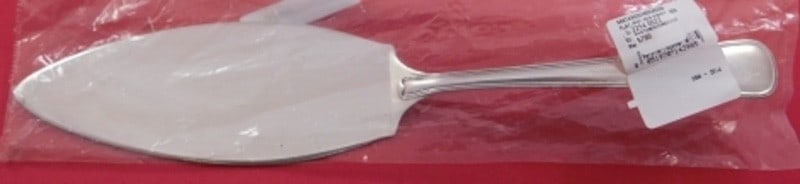 Buccellati Old Italian Sterling Silver Pie Server 10 1/2 in: Buccellati Old Italian Sterling Silver Pie Server 10 1/2 in Buccellati Old Italian sterling silver pie server with a flat handle and all sterling construction. It is new in factory sleeve, not monogra