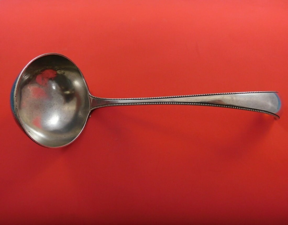 H.M. Netherlands 11.75 inch .833 Silver Beaded Soup Ladle Circa 1912: H.M. Netherlands 11.75 inch .833 Silver Beaded Soup Ladle Circa 1912 This exquisite soup ladle from H.M. Netherlands features a beautiful beaded design and dates back to circa 1912. Crafted from .833 