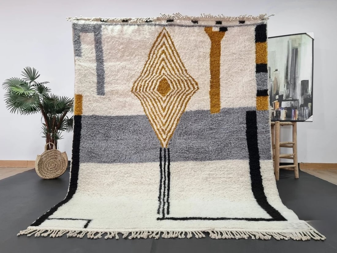 Authentic Handmade Moroccan Wool Rug 8 x 5 Feet: Authentic Handmade Moroccan Wool Rug 8 x 5 Feet Discover the beauty of this stunning handmade wool rug, meticulously crafted by skilled Berber women weavers in the Atlas Mountains of Morocco. This aut
