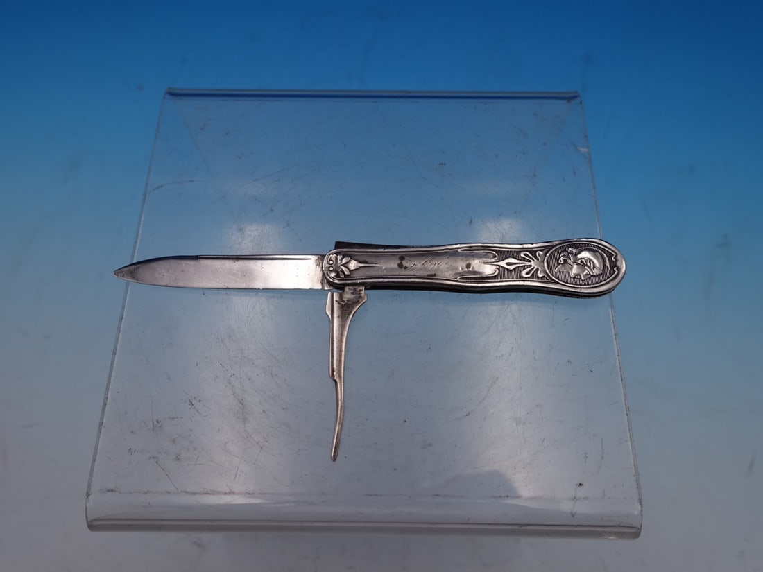 Victorian Medallion Pocket Knife by Wood & Hughes 5 1/4" Monogrammed: Victorian Medallion Pocket Knife by Wood & Hughes 5 1/4" Monogrammed This exquisite Medallion pocket knife by Wood & Hughes showcases the craftsmanship of the Victorian era (1850-1899). Made from coin