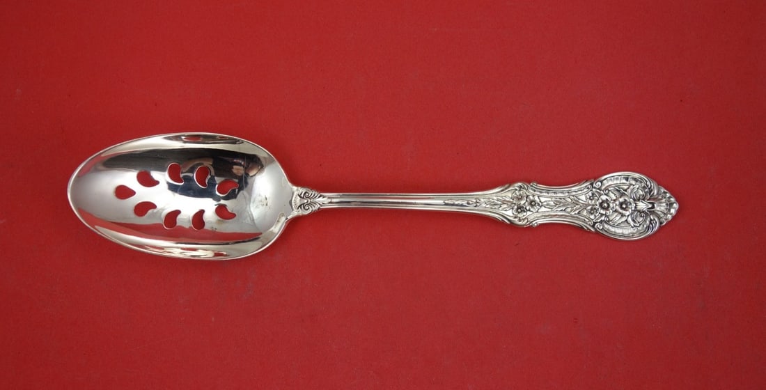 International Springtime Sterling Silver Pierced Serving Spoon 8 1 4: International Springtime Sterling Silver Pierced Serving Spoon 8 1 4 This is a Springtime pattern pierced serving spoon by International, crafted from sterling silver. Featuring a 9-hole design, this 