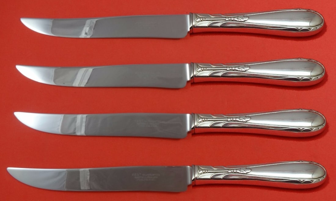 Oneida Heiress Sterling Silver Steak Knife Set 4pc Texas Sized: Oneida Heiress Sterling Silver Steak Knife Set 4pc Texas Sized Experience dining like never before with this exquisite 4-piece steak knife set from Oneida, featuring the elegant Heiress pattern. Each 