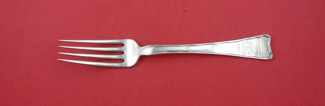 Tiffany & Co. Lap Over Edge Hand Engraved Sterling Silver Fork 8": Tiffany & Co. Lap Over Edge Hand Engraved Sterling Silver Fork 8" This exquisite dinner fork is crafted from sterling silver and features the distinctive Lap Over Edge Hand Engraved pattern by Tiffany