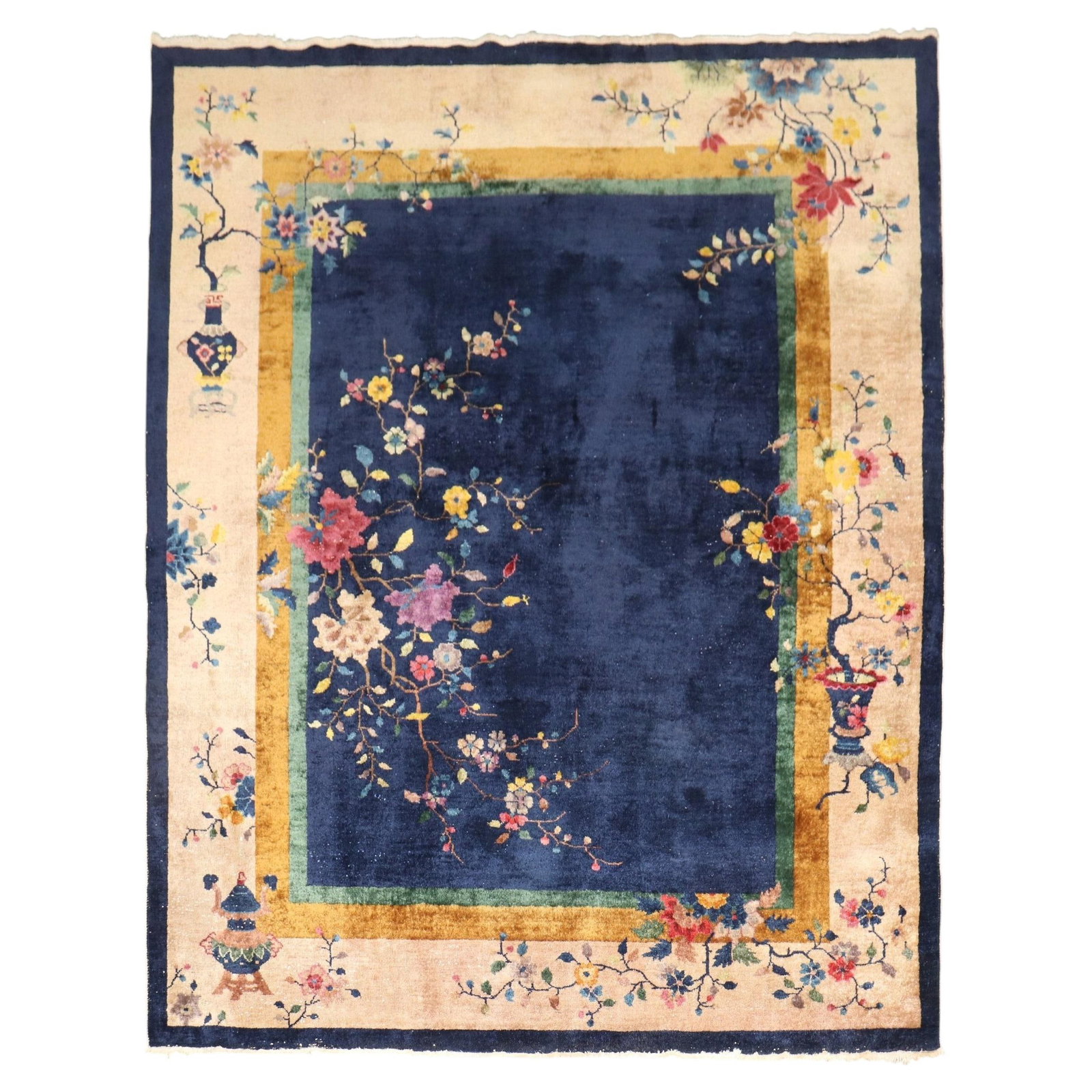 1930s Chinese Chippendale Wool Hand Knotted Floral Rug 7 x 8 9: 1930s Chinese Chippendale Wool Hand Knotted Floral Rug 7 x 8 9 This 1930s Chinese Art Deco carpet features a distinctive navy blue background adorned with elegant floral motifs. Crafted in the Chinese