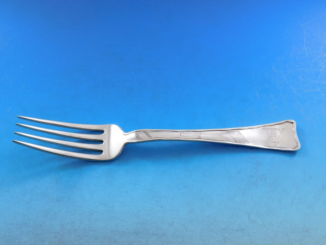 Tiffany & Co. Lap Over Edge Sterling Silver Dinner Fork with Stork Design: Tiffany & Co. Lap Over Edge Sterling Silver Dinner Fork with Stork Design This exquisite dinner fork, crafted by Tiffany & Co., showcases the elegant Lap Over Edge pattern. Made of high-quality sterli