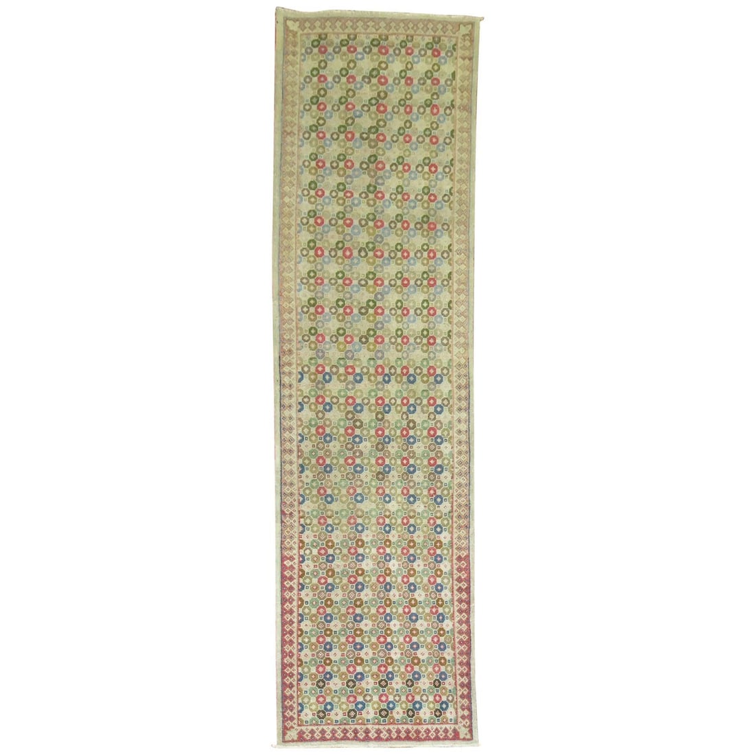 1940s Turkish Wool Hand Knotted Art Deco Runner: 1940s Turkish Wool Hand Knotted Art Deco Runner This vintage Turkish Anatolian runner from the 1940s features an Art Deco style with a repetitive all-over design. Expertly hand-knotted from wool, it