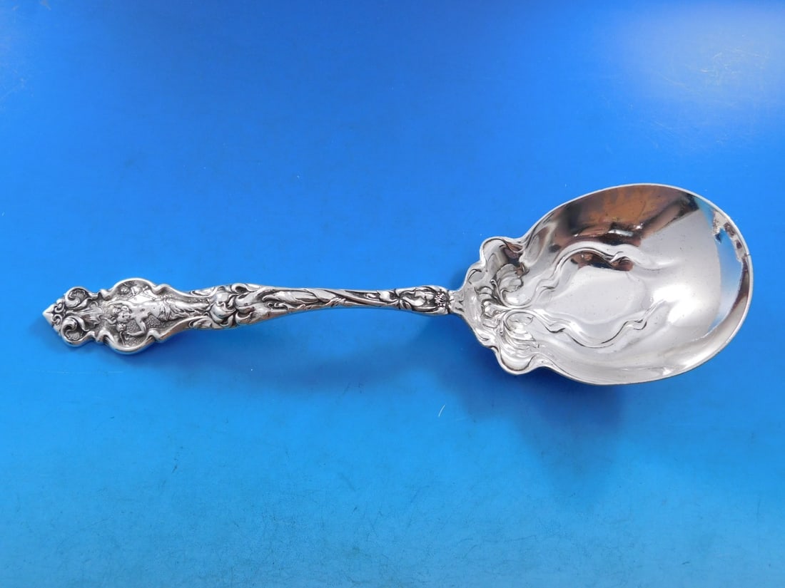 Wallace Irian Sterling Silver Art Nouveau Berry Spoon 8 5/8": Wallace Irian Sterling Silver Art Nouveau Berry Spoon 8 5/8" Presenting the Irian by Wallace Sterling Silver Berry Spoon, a striking example of Art Nouveau design. This elegant serving spoon, measurin