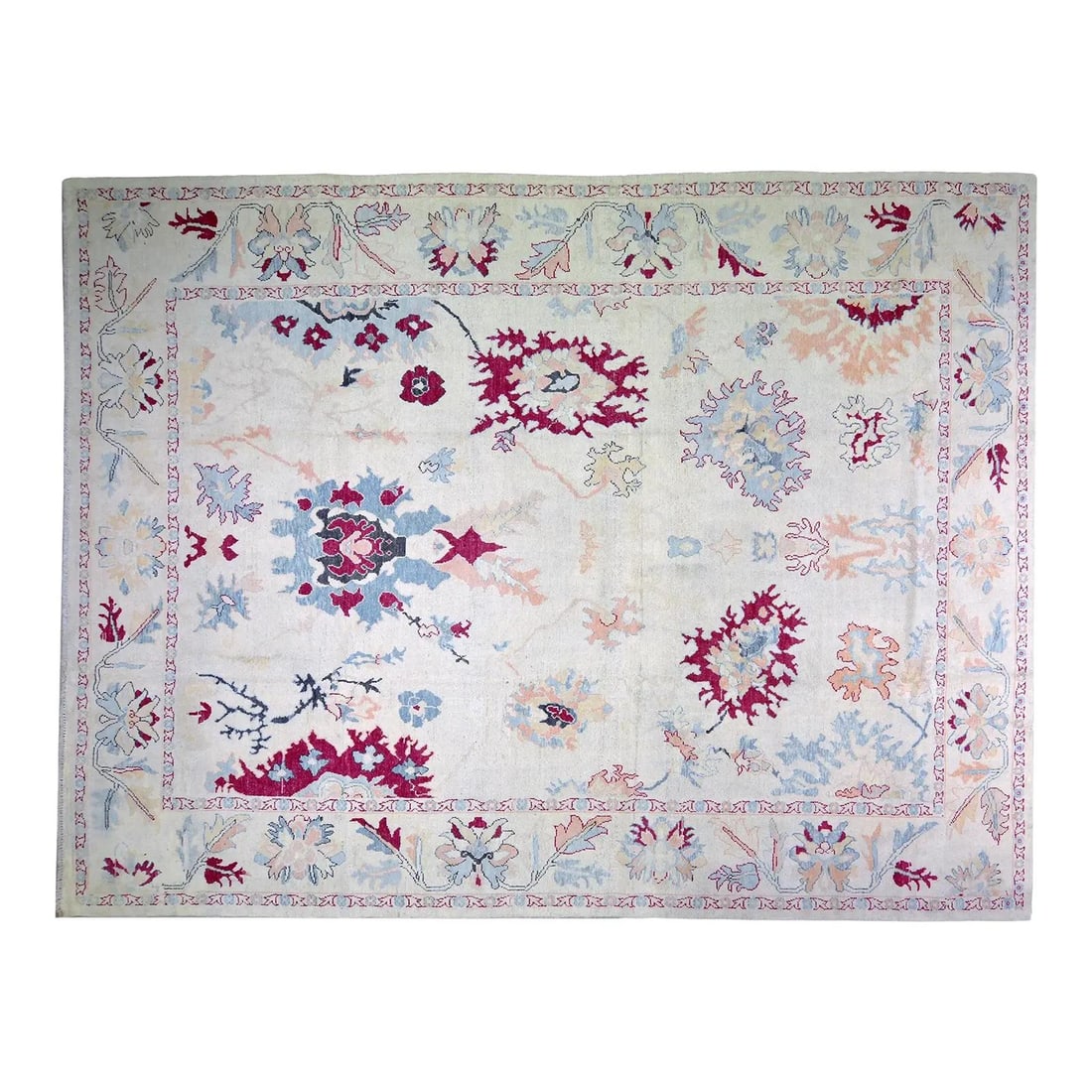 Large Wool Oushak Rug Hand Knotted in Pakistan Circa 1950s 10'x13': Large Wool Oushak Rug Hand Knotted in Pakistan Circa 1950s 10'x13' This hand-knotted Pakistani Oushak wool rug from the 1950s showcases traditional craftsmanship with a timeless design. Featuring a ri