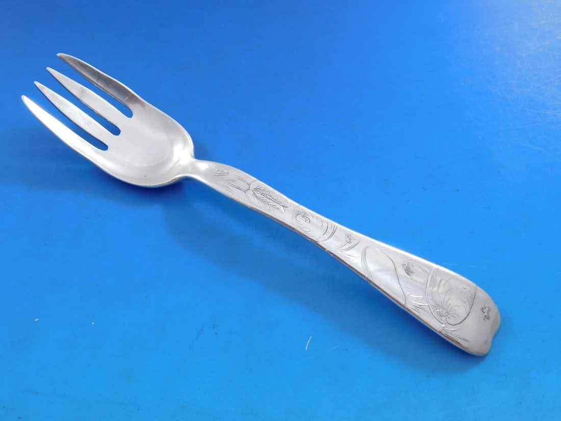 Tiffany Sterling Silver 6.5" Fish Fork Lap Over Edge Acid Etched: Tiffany Sterling Silver 6.5" Fish Fork Lap Over Edge Acid Etched Discover a stunning sterling silver fish fork from Tiffany & Co., beautifully crafted in the Lap Over Edge pattern. This exquisite piec
