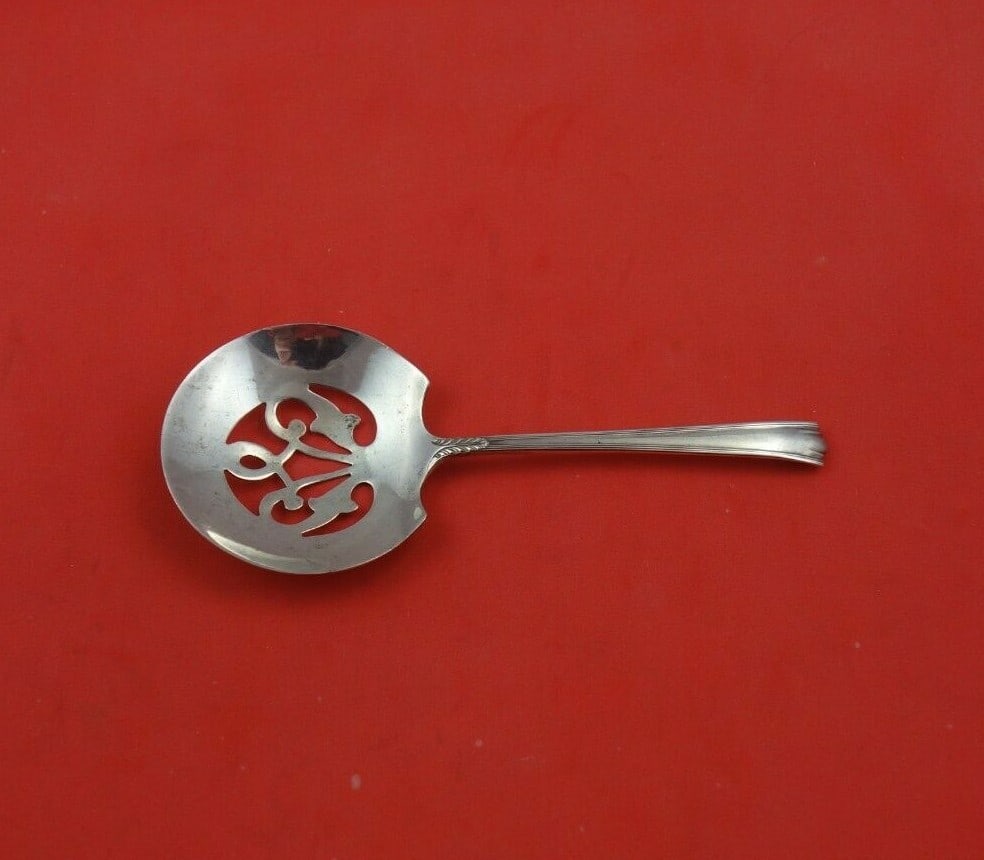 Lunt American Directoire Sterling Silver Nut Spoon 4 7/8 inch Serving Spoon: Lunt American Directoire Sterling Silver Nut Spoon 4 7/8 inch Serving Spoon This exquisite serving spoon from the American Directoire pattern by Lunt is crafted from high-quality sterling silver. Meas