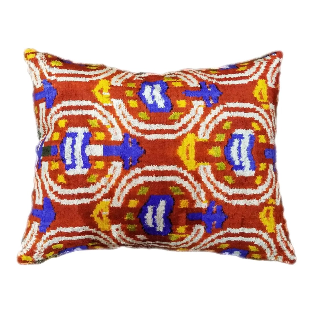 Red Silk Velvet Ikat Cushion with Linen Backing and Feather Insert: Red Silk Velvet Ikat Cushion with Linen Backing and Feather Insert This Silk Uzbek Ikat velvet pillow cushion features a hand-made design with a vibrant red color. It includes a natural linen backing,