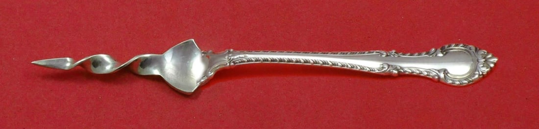 Gorham English Gadroon Sterling Silver Twisted Butter Pick 5 3/4": Gorham English Gadroon Sterling Silver Twisted Butter Pick 5 3/4" This exquisite butter pick, crafted in the English Gadroon pattern by Gorham, is a striking addition to any serving collection. Made o