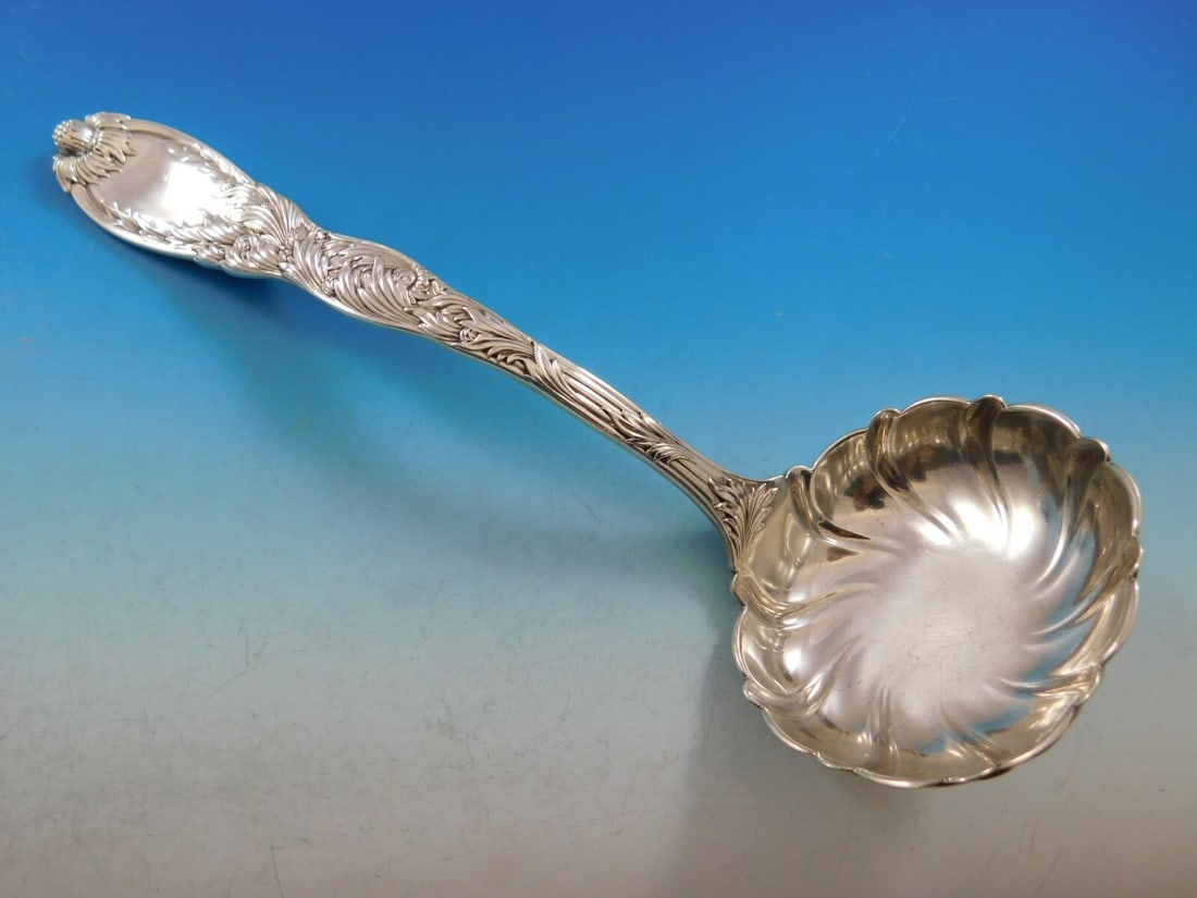 Tiffany & Co. Sterling Silver Oyster Ladle 11 Inch Chrysanthemum Pattern: Tiffany & Co. Sterling Silver Oyster Ladle 11 Inch Chrysanthemum Pattern This sterling silver oyster ladle is crafted by Tiffany & Co. in the Chrysanthemum pattern. Dating from 1850-1899, it features 