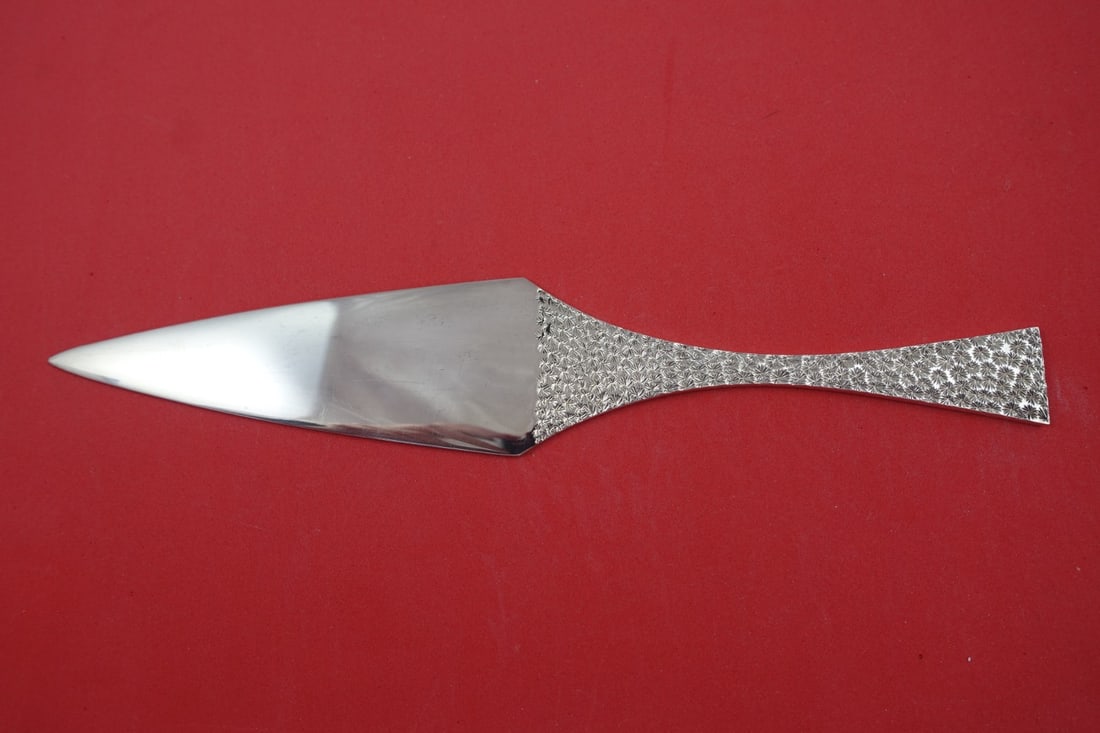 Paul Harrison 10 Inch English Sterling Estate Cake Server: Paul Harrison 10 Inch English Sterling Estate Cake Server This exquisite cake server is crafted from sterling silver and features a flat handle designed in the modernist style. Made in London in 1975 