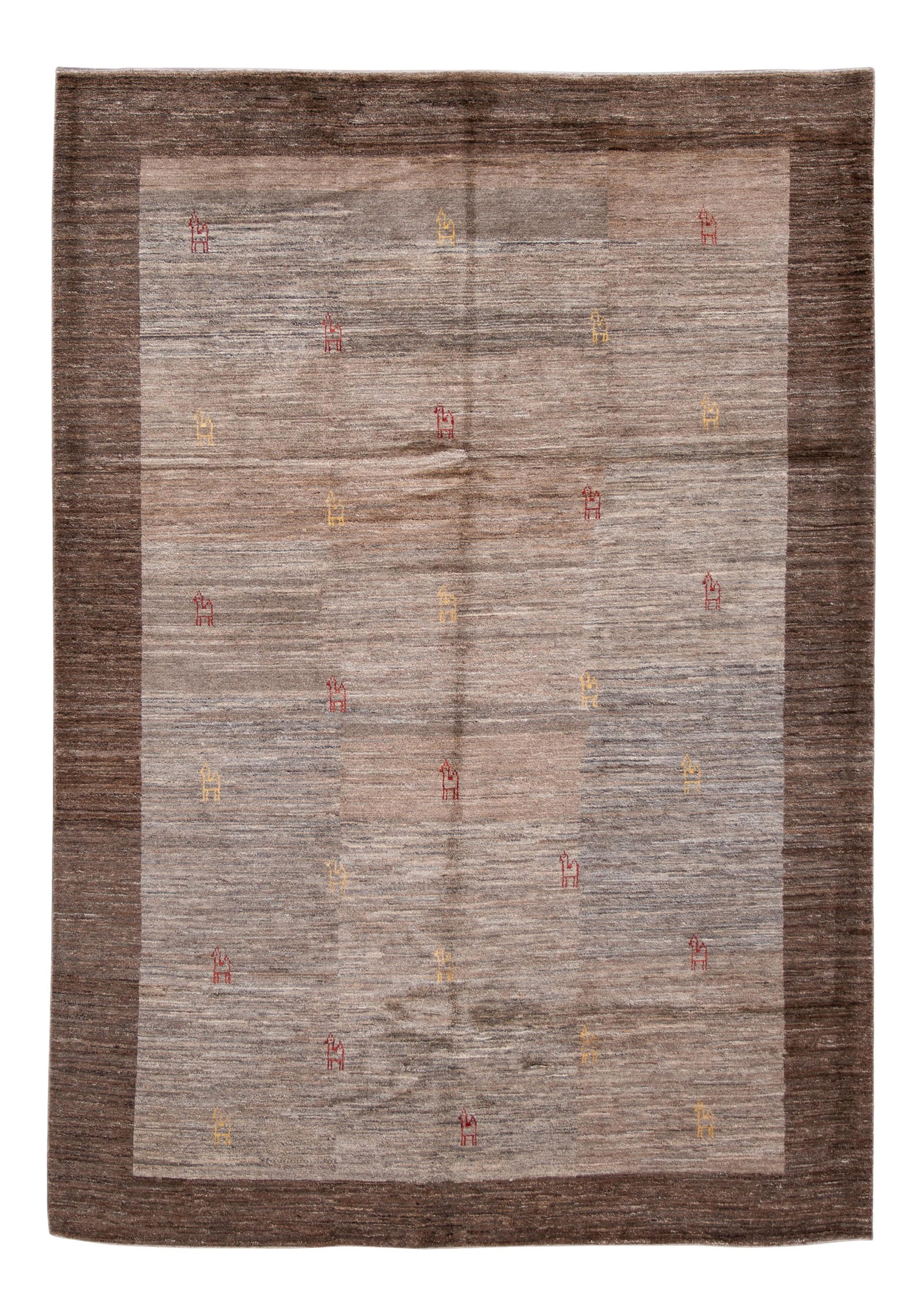 Handmade Modern Brown Persian Gabbeh Wool Rug 6'10 x 8'11: Handmade Modern Brown Persian Gabbeh Wool Rug 6'10 x 8'11 Discover the beauty of this Modern Persian Gabbeh handmade wool rug, featuring a captivating light brown and gray field. The rug is outlined b