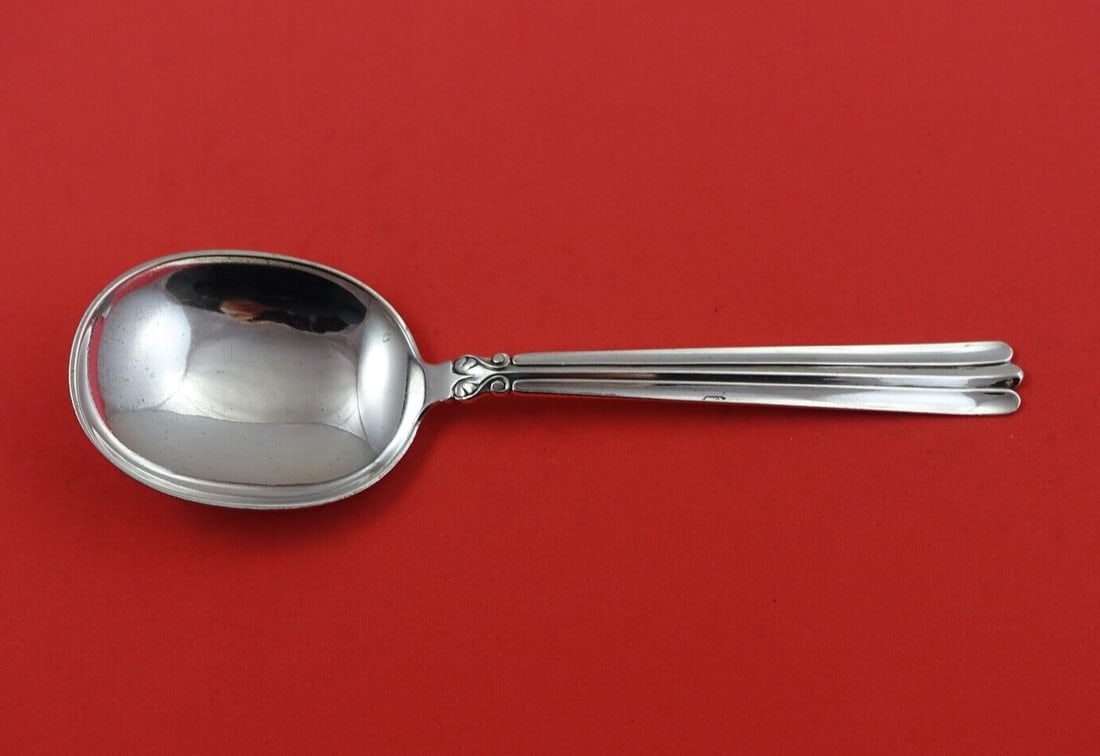 Danish Sterling Silver Berry Spoon by Various Makers 1958 7 7/8": Danish Sterling Silver Berry Spoon by Various Makers 1958 7 7/8" This exquisite Danish Sterling silver berry spoon is crafted from high-quality sterling silver and features a classic design by various