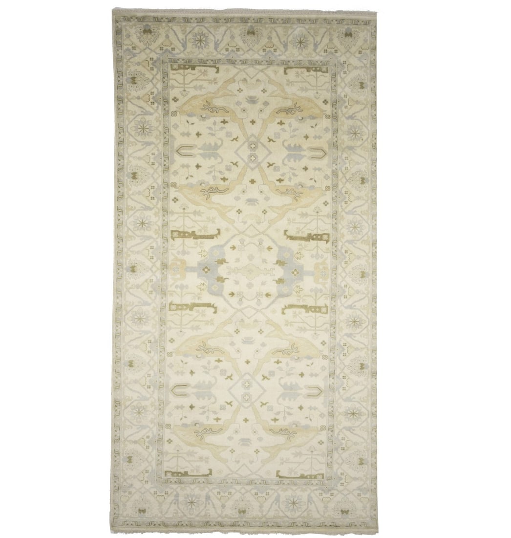 Hand-Knotted Wool Oushak Rug 9'1 x 17'8 Muted Modern Floral Design: Hand-Knotted Wool Oushak Rug 9'1 x 17'8 Muted Modern Floral Design This handmade extra large Oushak oriental rug features muted tones of cream, light gray, pastel brown, and other soft colors. Crafted