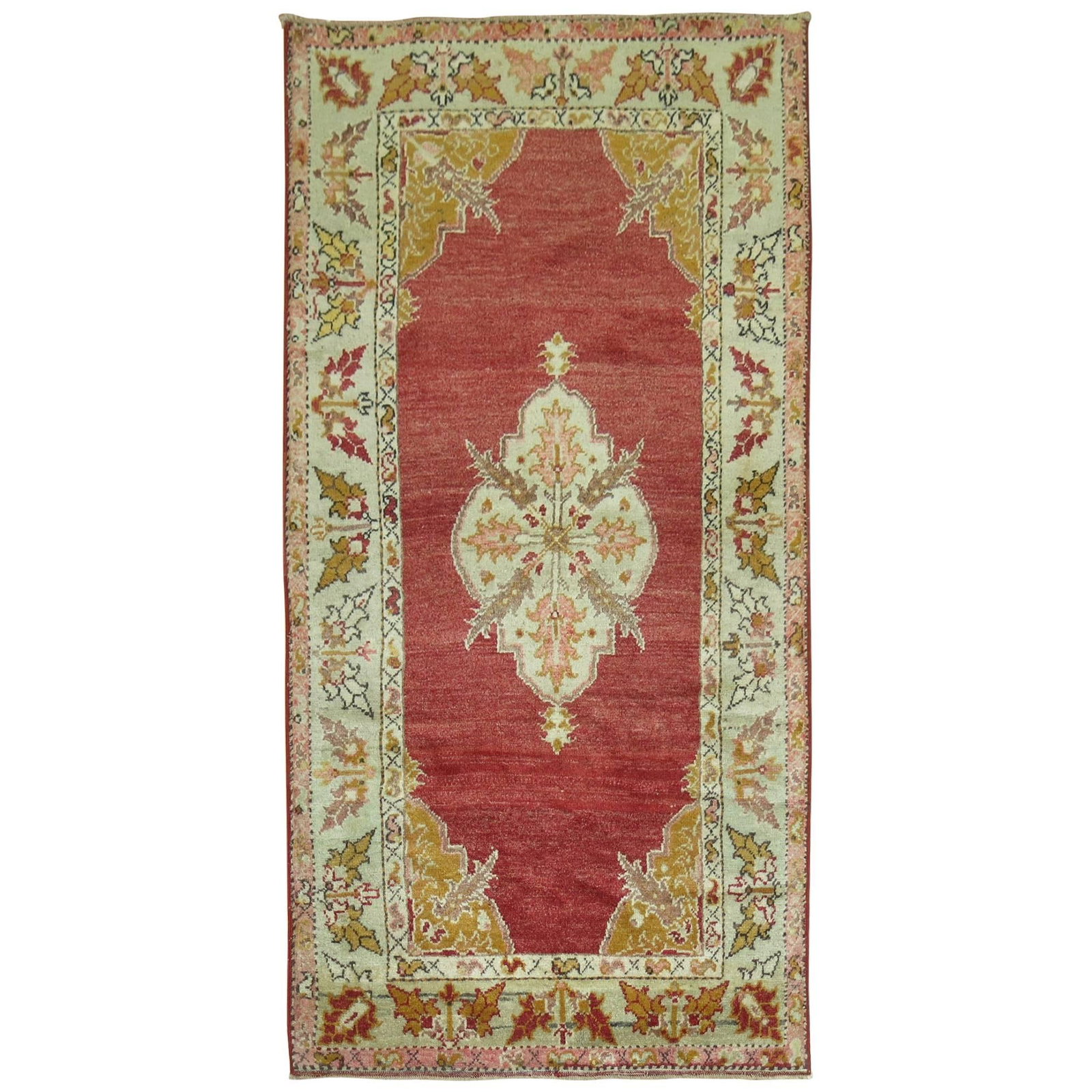 Agra Turkish Wool Hand Woven Scatter Rug 34 x 62 in: Agra Turkish Wool Hand Woven Scatter Rug 34 x 62 in This antique Turkish scatter throw rug, crafted circa 1920, features a spacious red open field medallion design. Hand-woven from wool in the Agra st