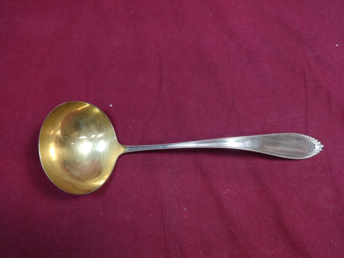 Gorham Virginia Sterling Silver Gold Washed Soup Ladle 12.5 Inch: Gorham Virginia Sterling Silver Gold Washed Soup Ladle 12.5 Inch This exquisite soup ladle is crafted in the Virginia pattern by Gorham, showcasing a stunning gold-washed finish. Made from high-qualit