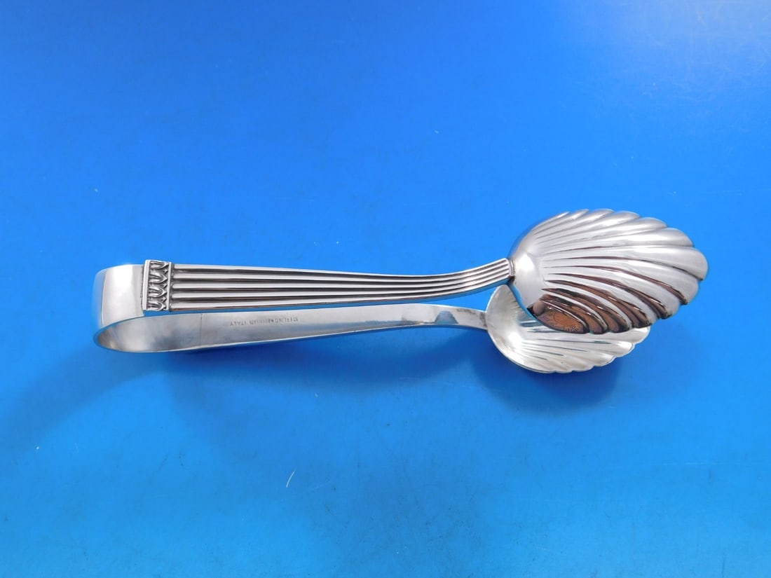 Buccellati Rigato Sterling Silver Ice Tongs 5 3/4 Inches: Buccellati Rigato Sterling Silver Ice Tongs 5 3/4 Inches This exquisite ice tong features the elegant Rigato pattern by Buccellati, crafted from high-quality sterling silver. Measuring 5 3/4 inches, t