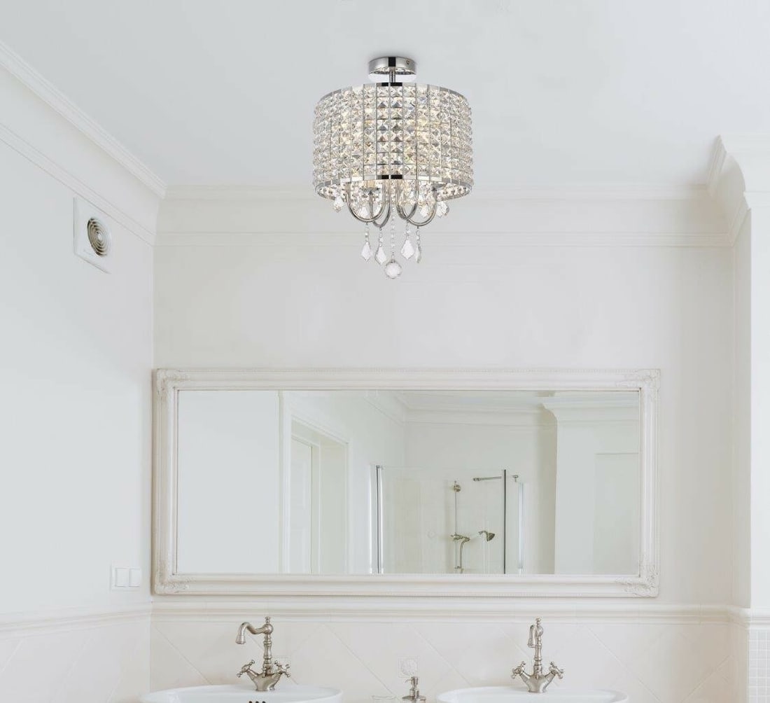 Living District Elise 4 Light Crystal Flush Mount Ceiling Fixture 14 in Chrome: Living District Elise 4 Light Crystal Flush Mount Ceiling Fixture 14 in Chrome This modern crystal flush mount chandelier features a chrome finish with clear crystals and a round profile. It is a 4-li